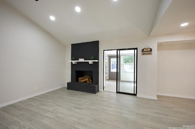 5914 Pineway, San Antonio, TX 78247 - unfurnished living room featuring a fireplace, baseboards, vaulted ceiling, recessed lighting, and light wood-style flooring
