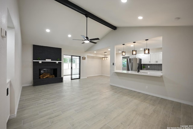 5914 Pineway, San Antonio, TX 78247 - unfurnished living room featuring ceiling fan, light wood-style floors, baseboards, and recessed lighting