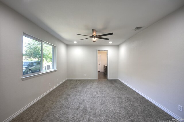 5914 Pineway, San Antonio, TX 78247 - empty room featuring a ceiling fan, dark colored carpet, recessed lighting, and baseboards