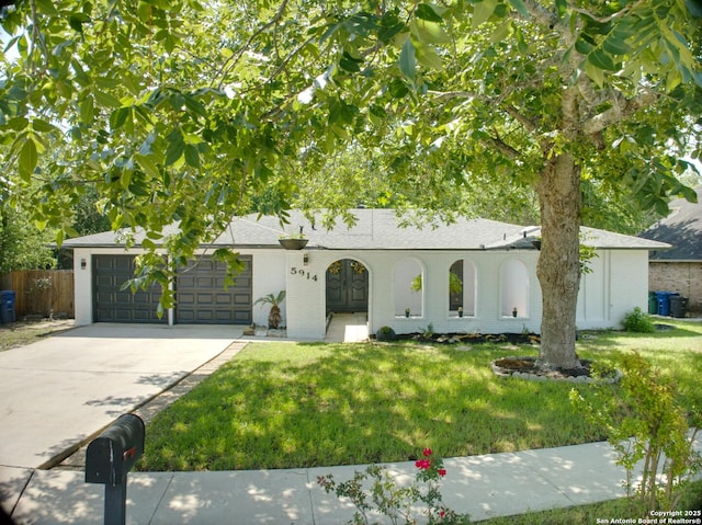 5914 Pineway, San Antonio, TX 78247 - view of front of property featuring an attached garage, driveway, brick siding, and roof with shingles