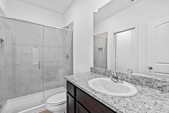 10819 Quinn Ct, San Antonio, TX 78252 - bathroom with toilet, a shower stall, and vanity
