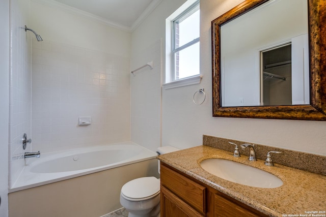 full bathroom featuring ornamental molding, toilet, vanity, and tub / shower combination