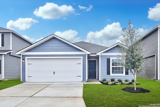 11920 Stroud Dr, San Antonio, TX 78252 - ranch-style house featuring driveway, a garage, and a front lawn