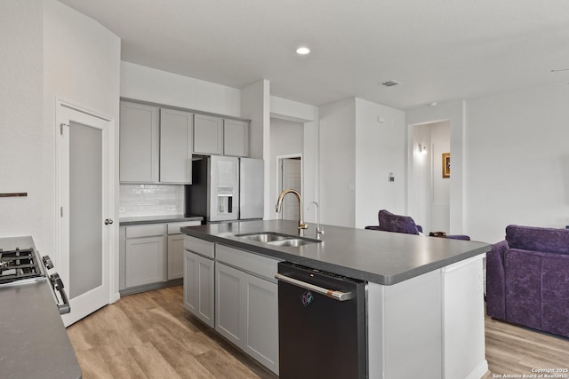 133 Edinburgh, Boerne, TX 78015 - kitchen with dishwasher, a sink, stainless steel refrigerator with ice dispenser, gray cabinets, and light wood-type flooring
