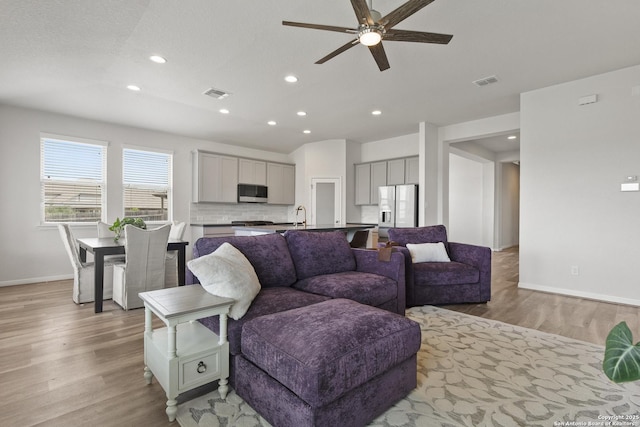 133 Edinburgh, Boerne, TX 78015 - living area featuring ceiling fan, light wood-type flooring, recessed lighting, and baseboards