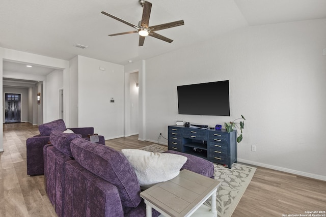 133 Edinburgh, Boerne, TX 78015 - living room with a ceiling fan, light wood-style flooring, and baseboards