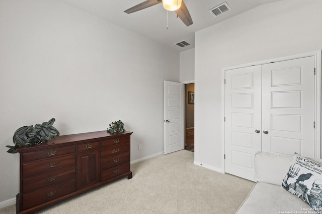 133 Edinburgh, Boerne, TX 78015 - bedroom featuring light colored carpet, baseboards, a closet, and ceiling fan