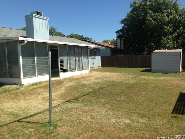 view of yard featuring a sunroom