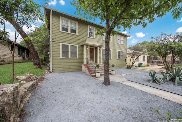 multi unit property featuring fence and a patio area