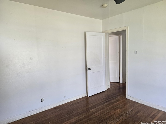 3218 E Southcross, San Antonio, TX 78223 - unfurnished room featuring wood finished floors, baseboards, a smoke detector, and a ceiling fan