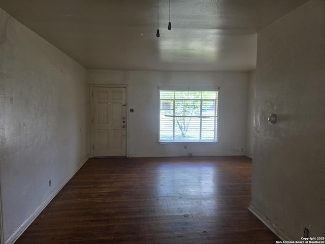 3218 E Southcross, San Antonio, TX 78223 - unfurnished room with wood finished floors and baseboards