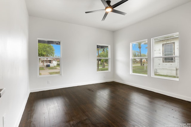 1144 Denver, San Antonio, TX 78210 - empty room with a ceiling fan, dark wood-style flooring, and baseboards