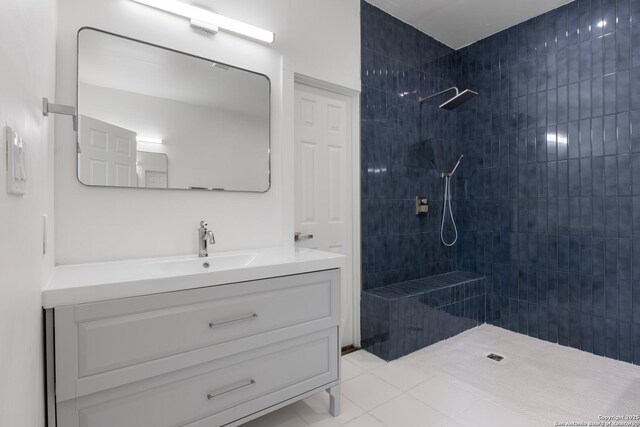1144 Denver, San Antonio, TX 78210 - full bath featuring vanity, a tile shower, and tile patterned flooring