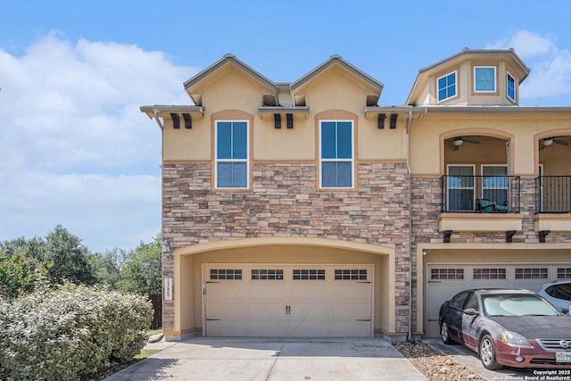 23807 Stately Oaks, San Antonio, TX 78260 - view of front facade with stone siding, stucco siding, and an attached garage