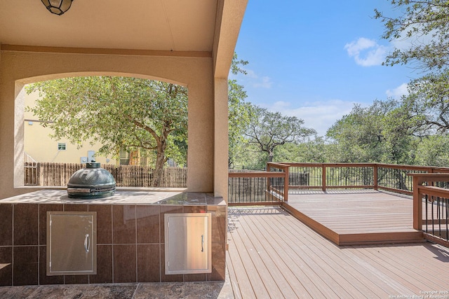 23807 Stately Oaks, San Antonio, TX 78260 - wooden deck with exterior kitchen and fence
