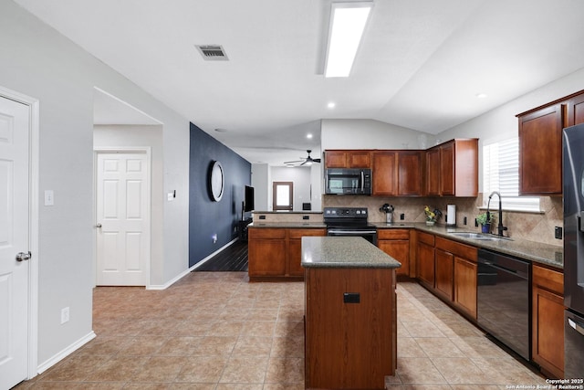 kitchen featuring stainless steel microwave, a sink, dishwashing machine, electric range, and a center island