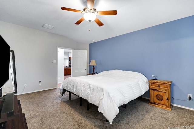 bedroom featuring carpet flooring, baseboards, lofted ceiling, and ceiling fan