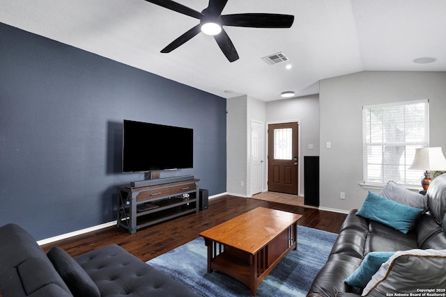 living area featuring lofted ceiling, wood finished floors, a ceiling fan, and baseboards