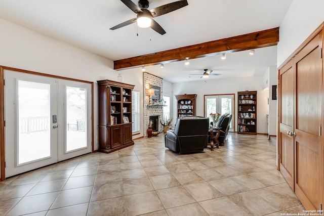 28426 Quadrille Ln, Boerne, TX 78015 - living room with ceiling fan, french doors, beamed ceiling, light tile patterned flooring, and a brick fireplace