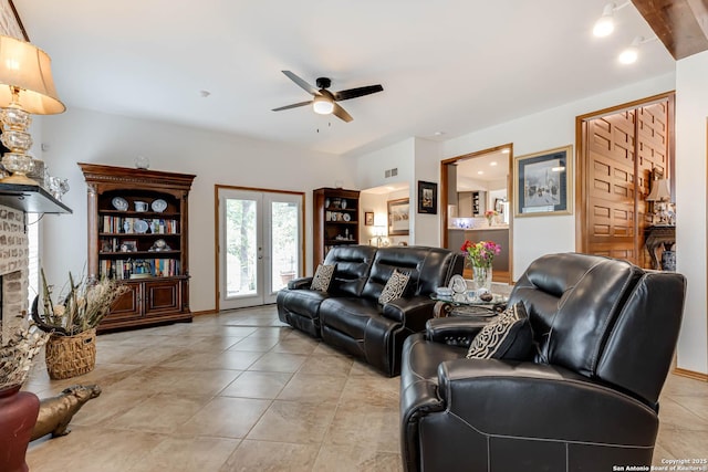 28426 Quadrille Ln, Boerne, TX 78015 - living room featuring ceiling fan, a brick fireplace, and light tile patterned flooring