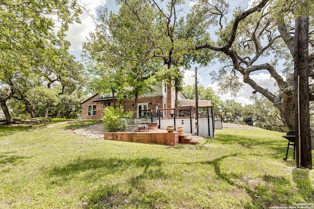 28426 Quadrille Ln, Boerne, TX 78015 - view of grassy yard featuring a deck