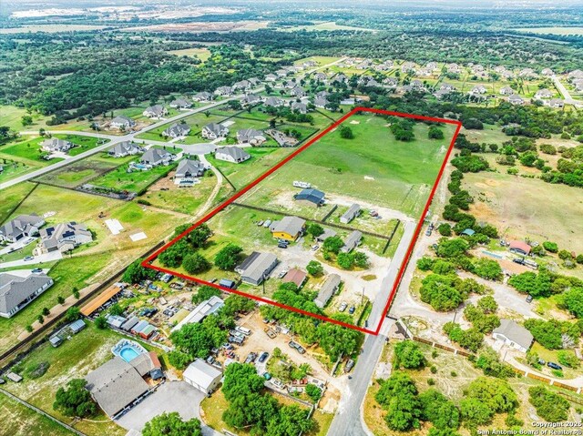 205 Montrose, Liberty Hill, TX 78642 - aerial view of residential area featuring property boundaries highlighted
