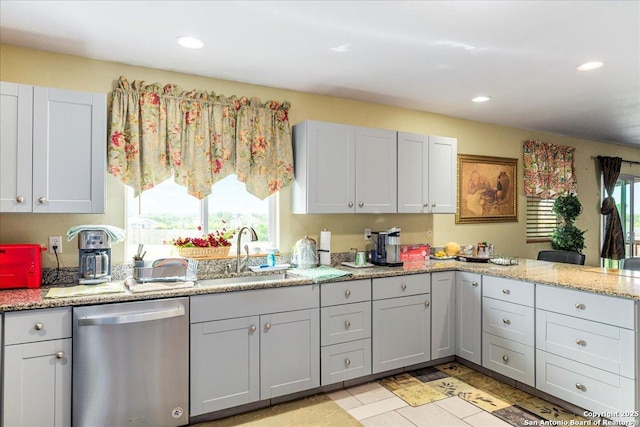205 Montrose, Liberty Hill, TX 78642 - kitchen with dishwasher, a sink, recessed lighting, light stone countertops, and a peninsula