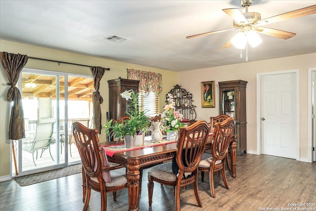 205 Montrose, Liberty Hill, TX 78642 - dining area featuring wood finished floors, a ceiling fan, and baseboards