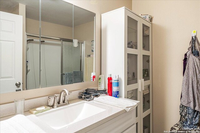 205 Montrose, Liberty Hill, TX 78642 - full bathroom featuring a shower stall and vanity