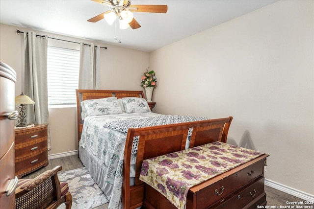 205 Montrose, Liberty Hill, TX 78642 - bedroom with baseboards, wood finished floors, and a ceiling fan