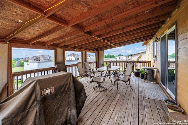 205 Montrose, Liberty Hill, TX 78642 - wooden terrace featuring outdoor dining space, a grill, and a residential view