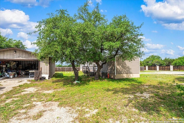 205 Montrose, Liberty Hill, TX 78642 - view of yard featuring an outbuilding and a garage