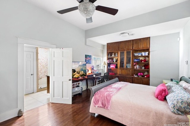 bedroom featuring wood finished floors and ceiling fan
