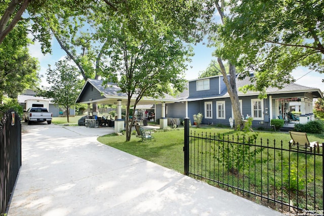 view of front of property with concrete driveway