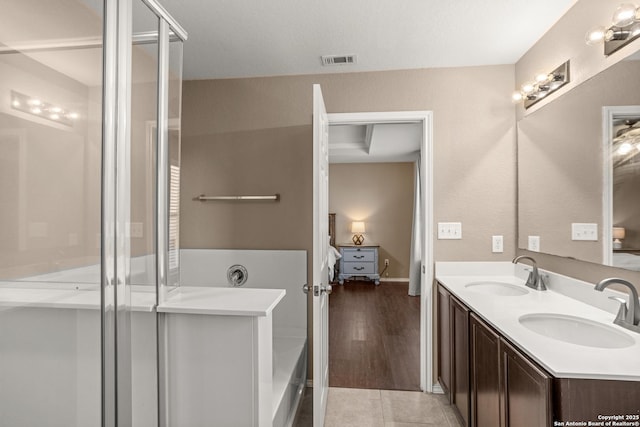 1617 Desert Candle, San Antonio, TX 78245 - ensuite bathroom with an enclosed shower and double vanity