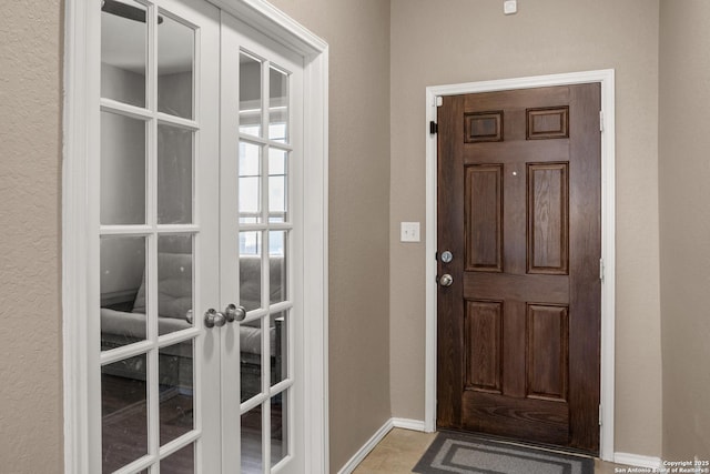 1617 Desert Candle, San Antonio, TX 78245 - doorway to outside featuring french doors and baseboards