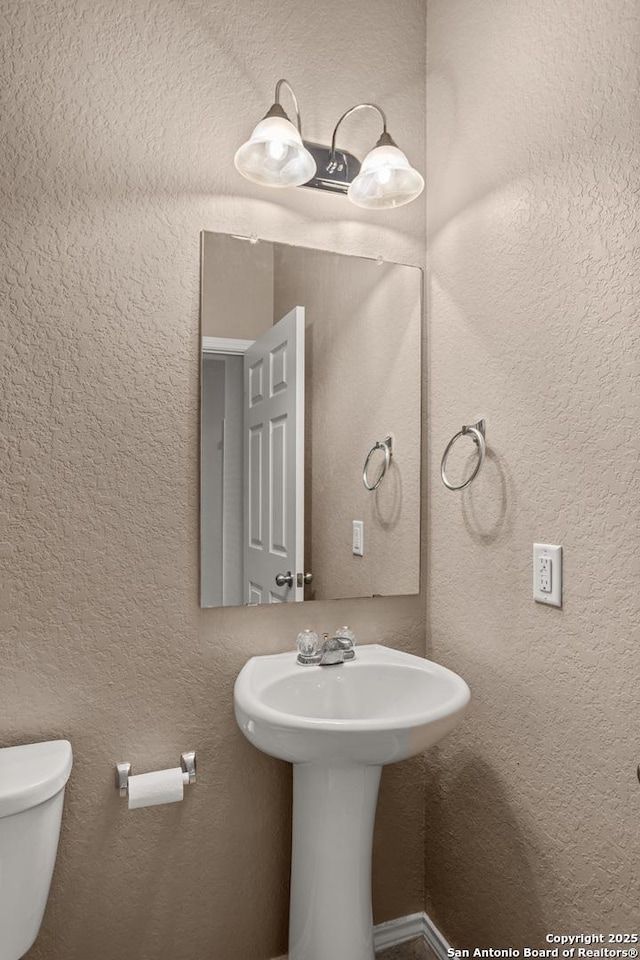 1617 Desert Candle, San Antonio, TX 78245 - half bath featuring toilet and a sink