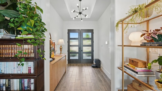 191 Crane Cir, Spring Branch, TX 78070 - doorway featuring a chandelier, wood finished floors, and french doors