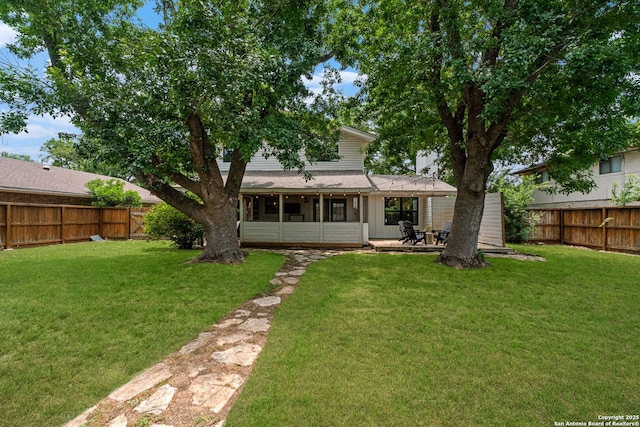 306 Chaparral Crk, Boerne, TX 78006 - back of property featuring a sunroom and a shingled roof