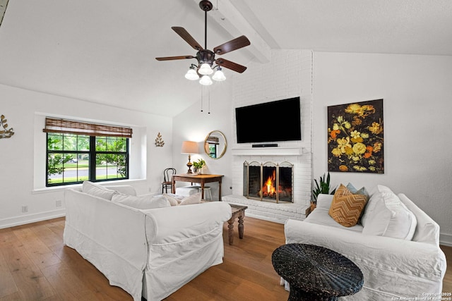 306 Chaparral Crk, Boerne, TX 78006 - living room featuring ceiling fan, wood finished floors, a fireplace, and baseboards