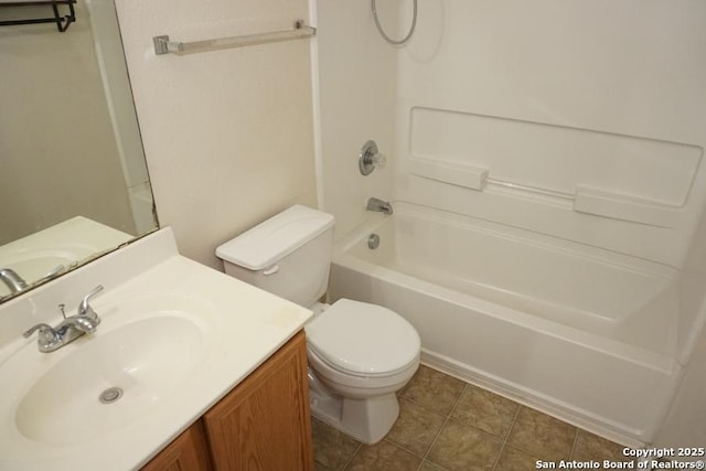 full bath with toilet, vanity, bathtub / shower combination, and tile patterned flooring