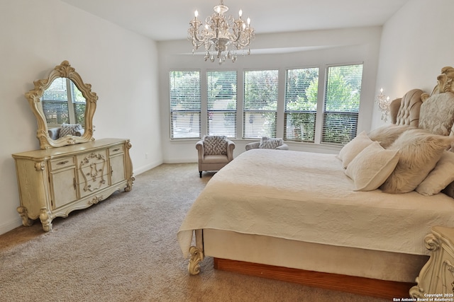 bedroom with a chandelier, multiple windows, and light carpet