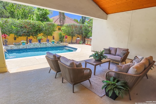 view of swimming pool featuring outdoor lounge area and a patio area