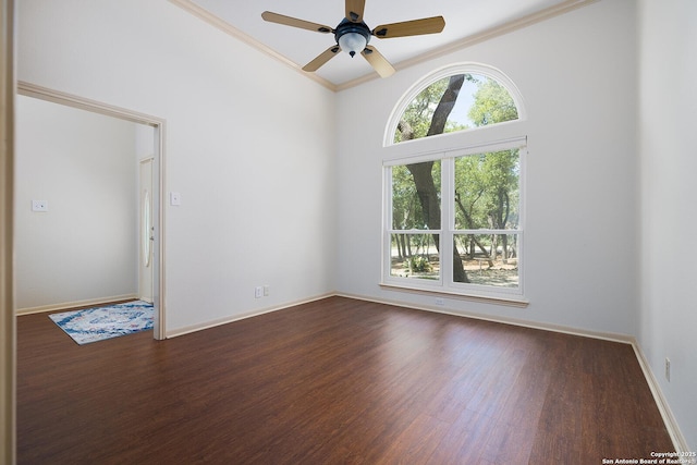 552 Mountain Oaks, Canyon Lake, TX 78133 - spare room featuring wood finished floors, crown molding, ceiling fan, and baseboards