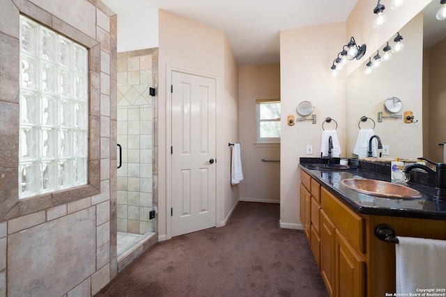 552 Mountain Oaks, Canyon Lake, TX 78133 - bathroom with a shower stall, double vanity, and baseboards