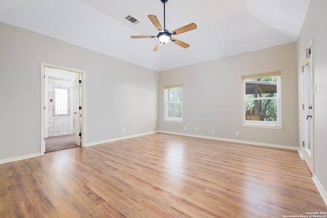 552 Mountain Oaks, Canyon Lake, TX 78133 - spare room with light wood finished floors, ceiling fan, vaulted ceiling, and baseboards