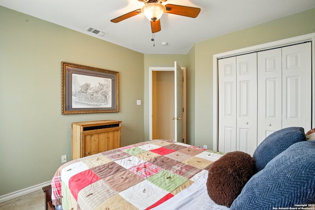 bedroom featuring carpet floors, a closet, baseboards, and ceiling fan