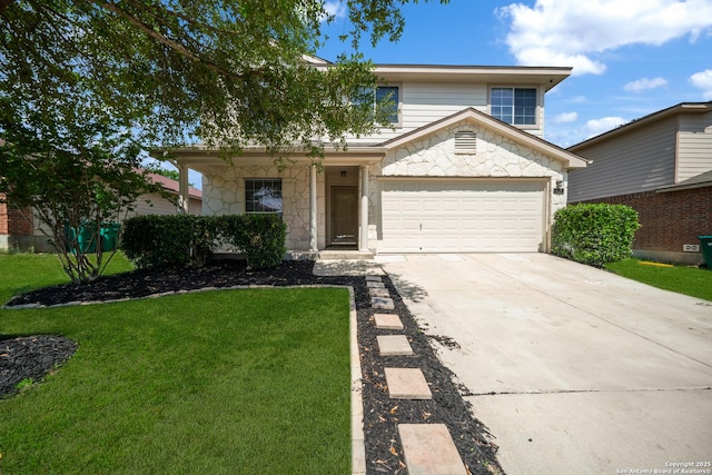 traditional-style house with driveway, stone siding, a front lawn, and a garage