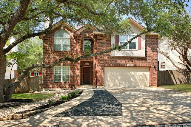 8818 Sarasota Woods, San Antonio, TX 78250 - view of front of property with driveway, fence, and brick siding