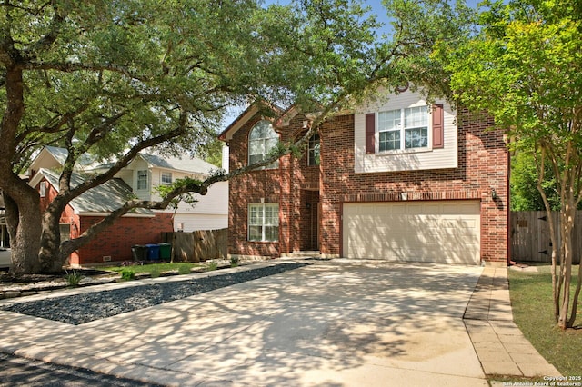 8818 Sarasota Woods, San Antonio, TX 78250 - traditional-style house with driveway, an attached garage, fence, and brick siding